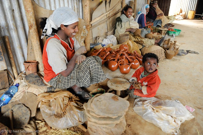 20120330_100206 Nikon D3S 2x3.jpg - One of the Kechene mothers and her son who shows pottery skills at  1 year of age!!